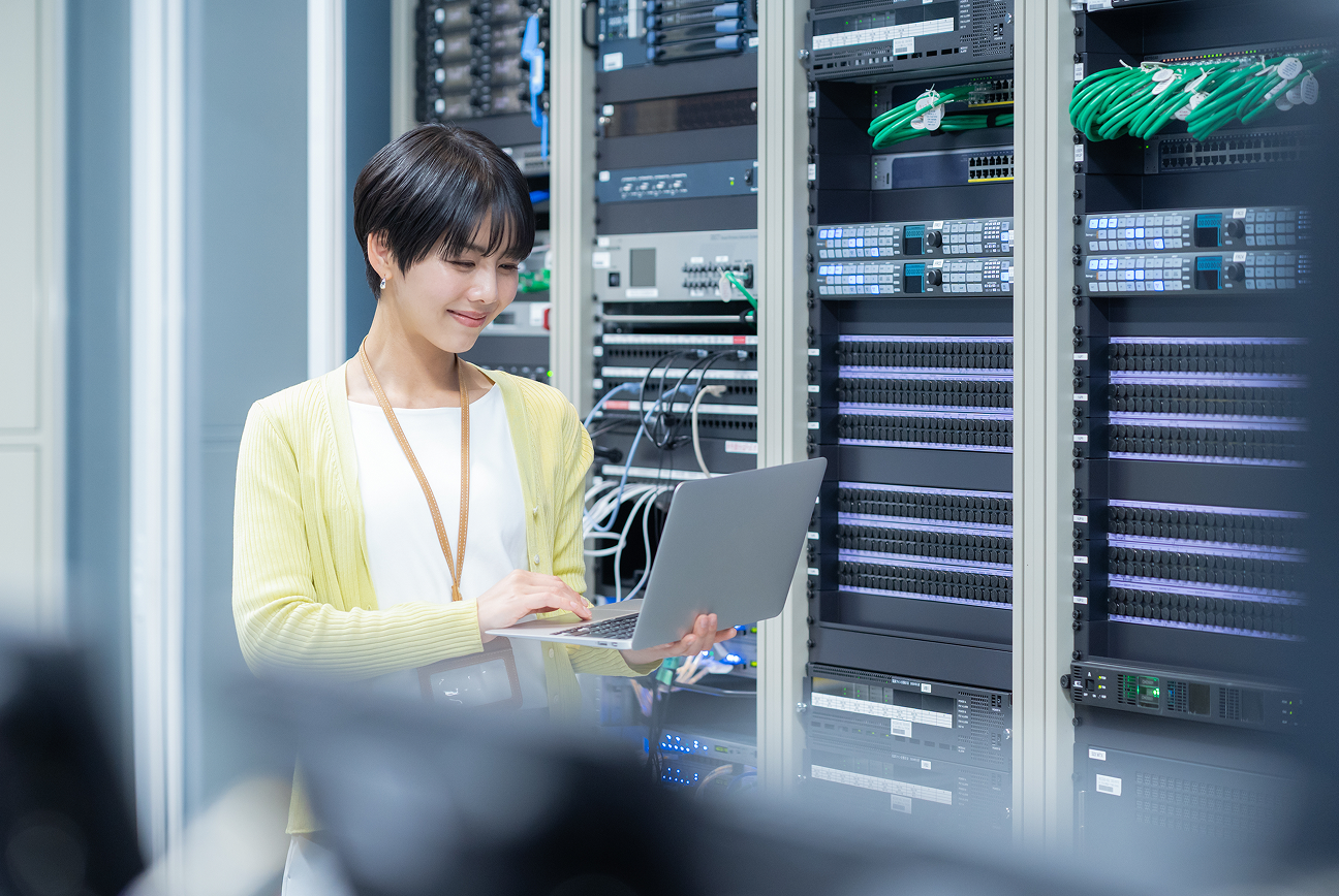 Engineer managing cloud infrastructure in data center environment